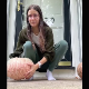 A cute girl wearing glasses shits on the doorstep of her home for part of her Halloween decoration idea. She shows us her dirty asshole when finished. Vertical format video. Over a minute.